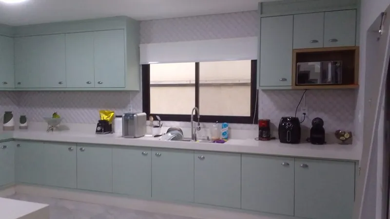 Projeto concluído: cozinha planejada verde em L em Taubaté